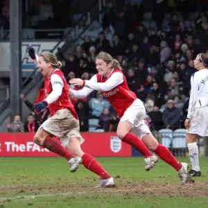 Jayne Ludlow celebrates scoring Arsenals goal with Ciara Grant and Katie Chapman