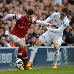 Jenkinson Fouls Sigurdsson: Intense Rivalry in Tottenham Hotspur vs Arsenal Premier League Clash