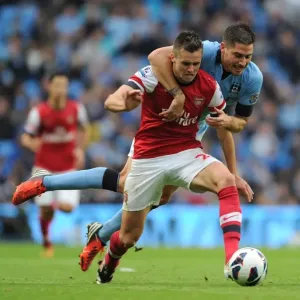Jenkinson vs Garcia: A Battle at the Etihad - Manchester City vs Arsenal: 1-1 Stalemate in the Premier League