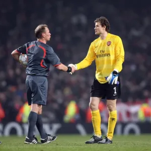 Jens Lehmann (Arsenal) shakes hands with referee Claus Larsen after the match Jens Lehmann (Arsenal) shakes hands with referee Claus Larsen after the match