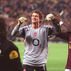 Jens Lehmann and Kolo Toure (Arsenal) celebrate their draw that puts them into the final
