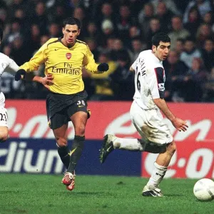 Jeremie Aliadiere breaks past Tal Ben Haim and Idan Tal to set up the 2nd Arsenal goal
