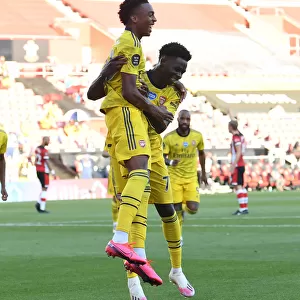 Joe Willock and Bukayo Saka Celebrate Arsenal's Winning Goals Against Southampton (2019-20)