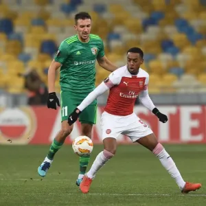 Joe Willock vs. Vyacheslav Sharpar: Intense Clash in Arsenal's Europa League Battle against Vorskla Poltava