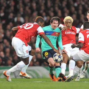 Johan Djourou, Alex Song and Emmanuel Eboue (Arsenal) Lionel Messi (Barcelona)