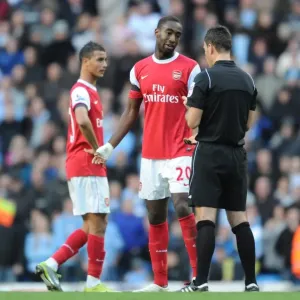 Johan Djourou (Arsenal) is booked by Mark Clattebnburg. Manchester City 0: 3 Arsenal
