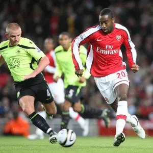 Johan Djourou (Arsenal) Lee Cattermole (Wigan) Johan Djourou (Arsenal) Lee Cattermole (Wigan)