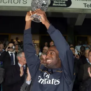Johan Djourou (Arsenal) lifts the Chapman trophy Johan Djourou (Arsenal) lifts the Chapman trophy
