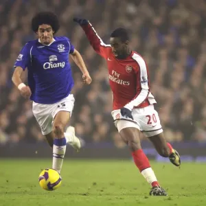Johan Djourou (Arsenal) Marouane Fellaini (Everton) Johan Djourou (Arsenal) Marouane Fellaini (Everton)