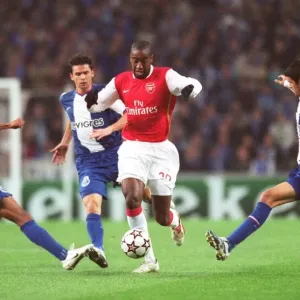 Johan Djourou (Arsenal) Paulo Assuncao and Lucho Gonzalez (Porto)