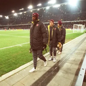 Johan Djourou, Arturo Lupoli and Cesc Fabregas (Arsenal) make their way to the substitutes bench aft Johan Djourou, Arturo Lupoli and Cesc Fabregas (Arsenal) make their way to the substitutes bench aft
