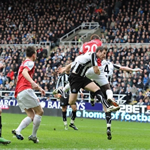 Johan Djourou heads past Newcastle goalkeeper Steve Harper to score the 2nd Arsenal goal