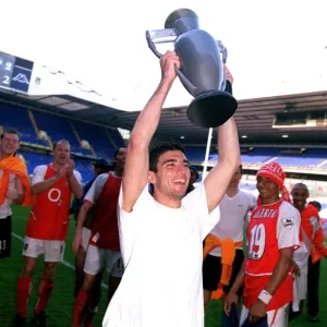Jose Reyes (Arsenal) celebrates winning the League with an inflatable trophy Jose Reyes (Arsenal) celebrates winning the League with an inflatable trophy