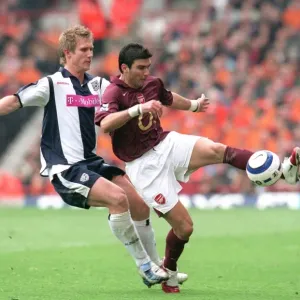 Jose Reyes (Arsenal) Martin Albrechtsen (West Brom) Jose Reyes (Arsenal) Martin Albrechtsen (West Brom)