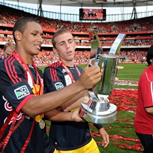 Juan Agudelo and John Rooney (Red Bulls) with the Emirates Cup Trophy. Arsenal 1