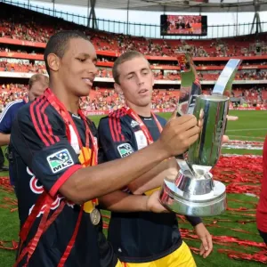 Juan Agudelo and John Rooney (Red Bulls) with the Emirates Cup Trophy. Arsenal 1