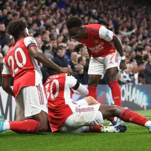 Jubilant Moment: Smith Rowe and Saka Celebrate Arsenal's Victory over Chelsea, Premier League 2021-22