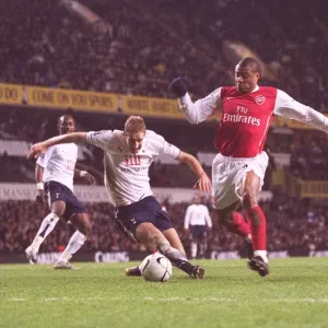 Julio Baptista scores Arsenals 1st goal under pressure from Michael Dawson Julio Baptista scores Arsenals 1st goal under pressure from Michael Dawson