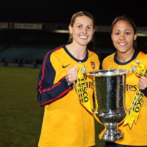 Kellt Smith and Alex Scott (Arsenal) with the League Cup trophy