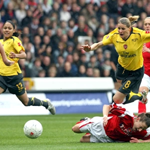 Kelly Smith (Arsenal) is fouled by Maria Bertelli (Charlton)