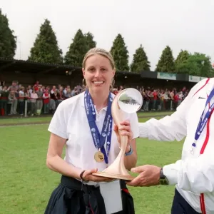 Kelly Smith and Vic Akers the Arsenal Manager with the European Trophy Kelly Smith and Vic Akers the Arsenal Manager with the European Trophy