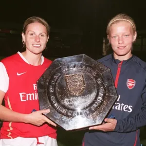 Kelly Smitha and Katie Chapman (Arsenal Ladies) with the Community Shield