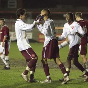 Kieran Gibbs celebrates scoring for Arsenal with Rui Fonte and Sanchez Watt