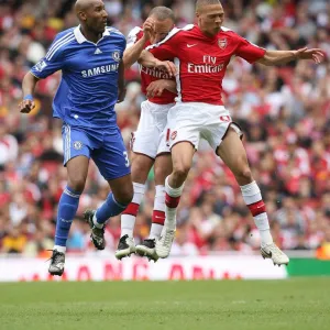 Kieran Gibbs and Mikael Silvestre (Arsenal) Nicklas Anelka (Chelsea)