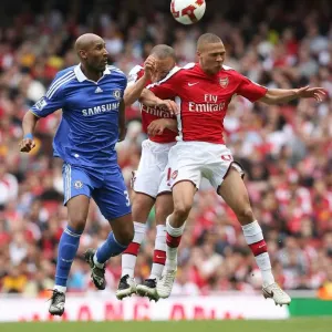 Kieran Gibbs and Mikael Silvestre (Arsenal) Nicklas Anelka (Chelsea) Kieran Gibbs and Mikael Silvestre (Arsenal) Nicklas Anelka (Chelsea)