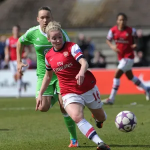 Kim Little Outruns Josephine Henning: Arsenal Ladies vs. VfL Wolfsburg in UEFA Women's Champions League Semi-Final