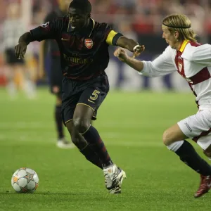 Kolo Toure (Arsenal) Christian Poulsen (Seville)