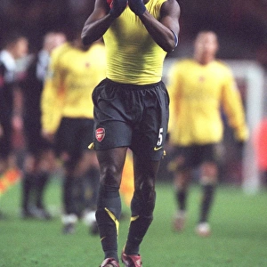 Kolo Toure (Arsenal) claps the fans after the match