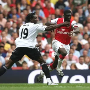 Kolo Toure (Arsenal) Claude Davis (Derby) Kolo Toure (Arsenal) Claude Davis (Derby)