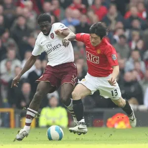 Kolo Toure (Arsenal) Ji Sung Park (Manchester United) Kolo Toure (Arsenal) Ji Sung Park (Manchester United)