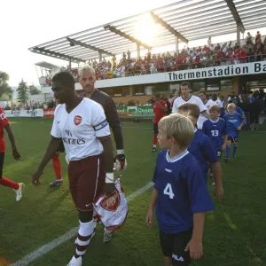 Kolo Toure (Arsenal) leads out the team Kolo Toure (Arsenal) leads out the team