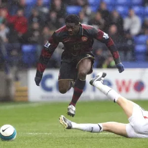 Kolo Toure (Arsenal) Matt Taylor (Bolton) Kolo Toure (Arsenal) Matt Taylor (Bolton)