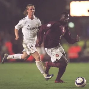 Kolo Toure (Arsenal) Raul Bravo (Real Madrid) Kolo Toure (Arsenal) Raul Bravo (Real Madrid)