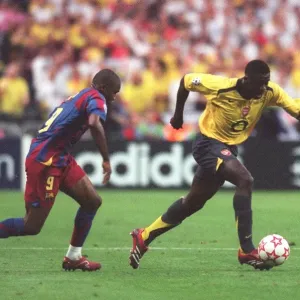 Kolo Toure (Arsenal) Samule Eto o (Barcelona) Kolo Toure (Arsenal) Samule Eto o (Barcelona)
