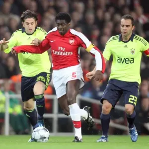 Kolo Toure (Arsenal) Ugur Boral and Semih Senturk (Fenerbahce) Kolo Toure (Arsenal) Ugur Boral and Semih Senturk (Fenerbahce)