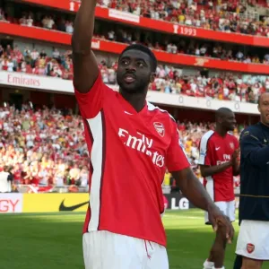 Kolo Toure (Arsenal) waves to the fans after the match