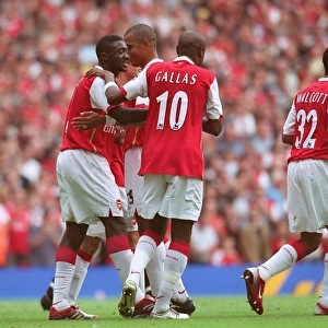Kolo Toure celebrates Arsenals 1st goal