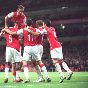 Kolo Toure celebrates scoring Arsenals 2nd goal with Mathieu Flamini