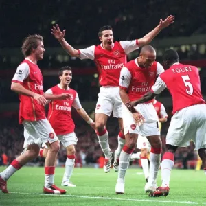 Kolo Toure Celebrates with Thierry Henry and Robin van Persie Print Kolo Toure Celebrates with Thierry Henry and Robin van Persie Print