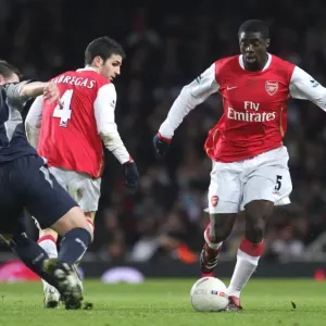 Kolo Toure and Cesc Fabregas (Arsenal) Kevin Nolan (Bolton) Kolo Toure and Cesc Fabregas (Arsenal) Kevin Nolan (Bolton)