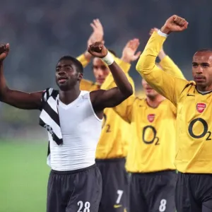 Kolo Toure and Thierry Henry (Arsenal) celebrate at the end of the match