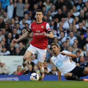 Koscielny Outmaneuvers Chadli: Arsenal vs. Tottenham, Premier League 2013-14 Koscielny Outmaneuvers Chadli: Arsenal vs. Tottenham, Premier League 2013-14