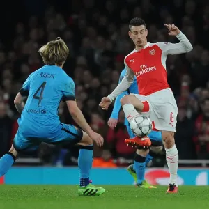 Koscielny vs. Rakitic: A Champions League Battle at the Emirates Koscielny vs. Rakitic: A Champions League Battle at the Emirates