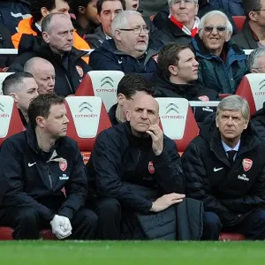 (L-R) Colin Lewin (Physio), Steve Bould (Assistant Manager) and Arsene Wenger (Manager)
