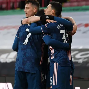 Lacazette, Martinelli, and Xhaka's Triumphant Goal Celebration: Sheffield United vs. Arsenal, Premier League 2020-21 Lacazette, Martinelli, and Xhaka's Triumphant Goal Celebration: Sheffield United vs. Arsenal, Premier League 2020-21