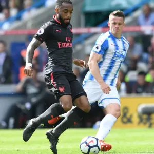 Lacazette vs. Hogg: Intense Battle in Huddersfield Town vs. Arsenal Premier League Clash Lacazette vs. Hogg: Intense Battle in Huddersfield Town vs. Arsenal Premier League Clash